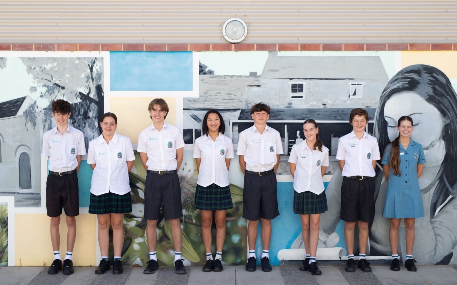Group of students in custom school uniforms
